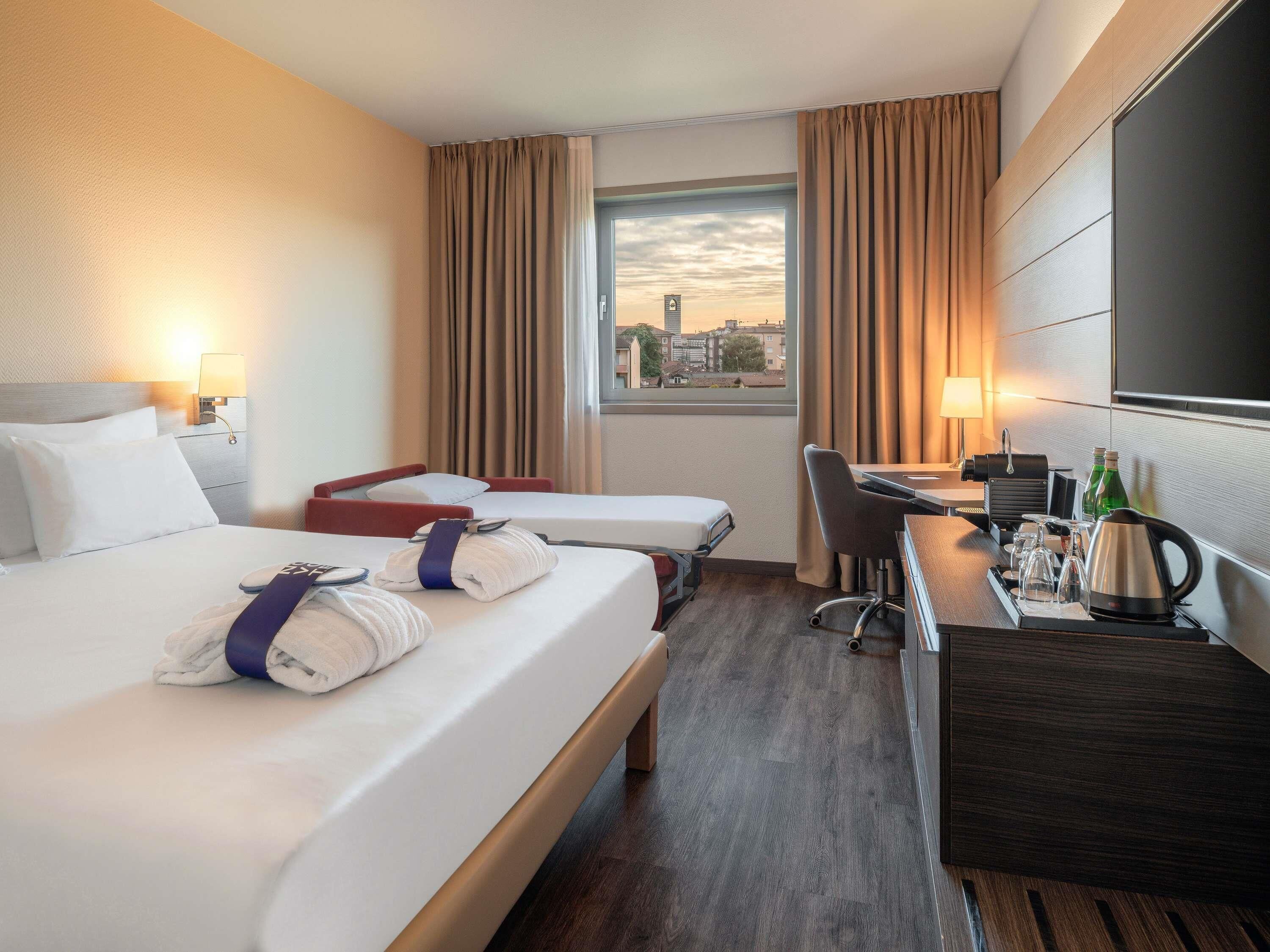 Rom – executive, 1 kingsize-seng med sovesofa | Dundyner, minibar, safe på rommet og skrivebord