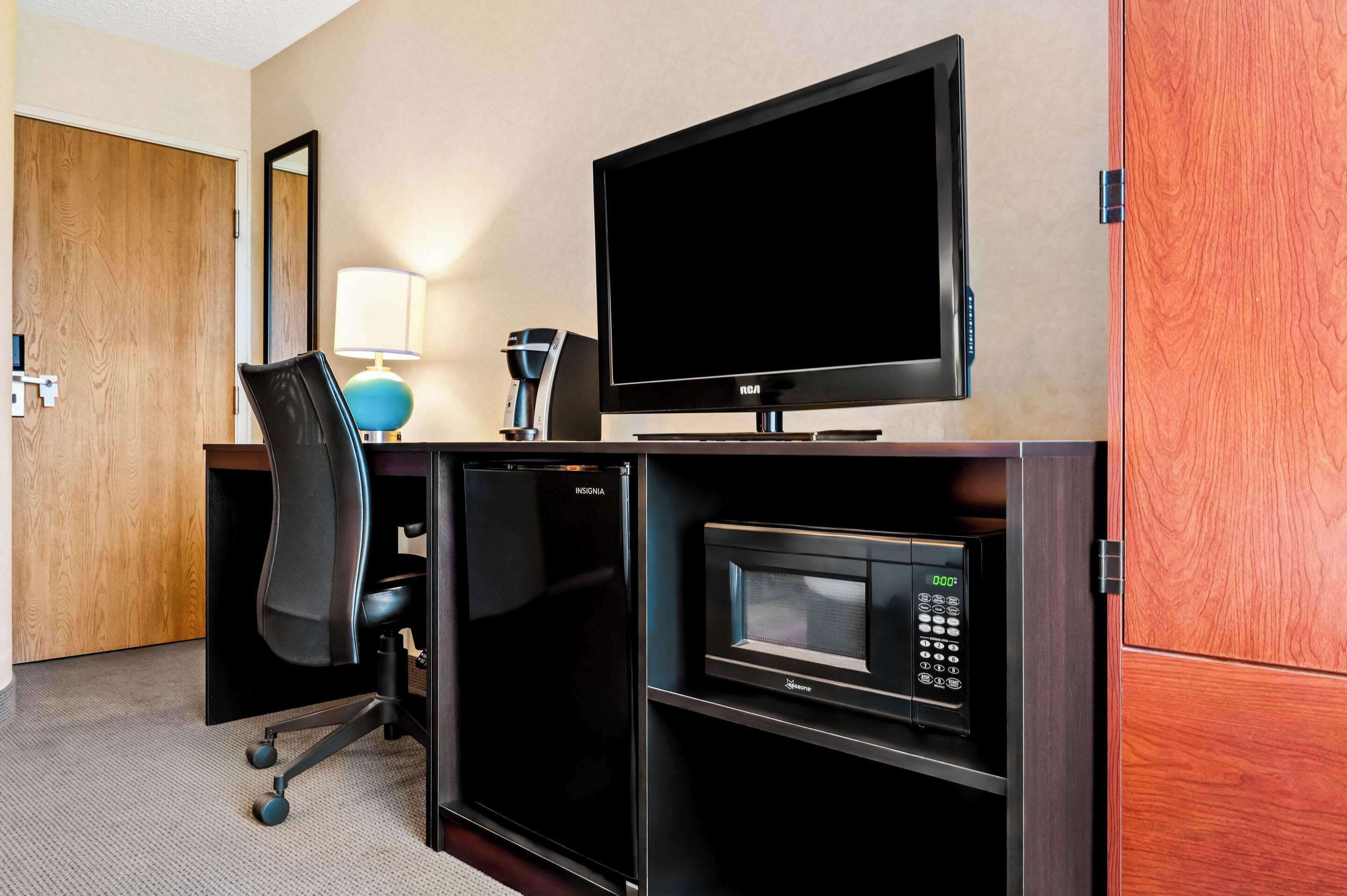 room, 1 king bed, non smoking | in-room safe, desk, iron/ironing board, free cots/infant beds