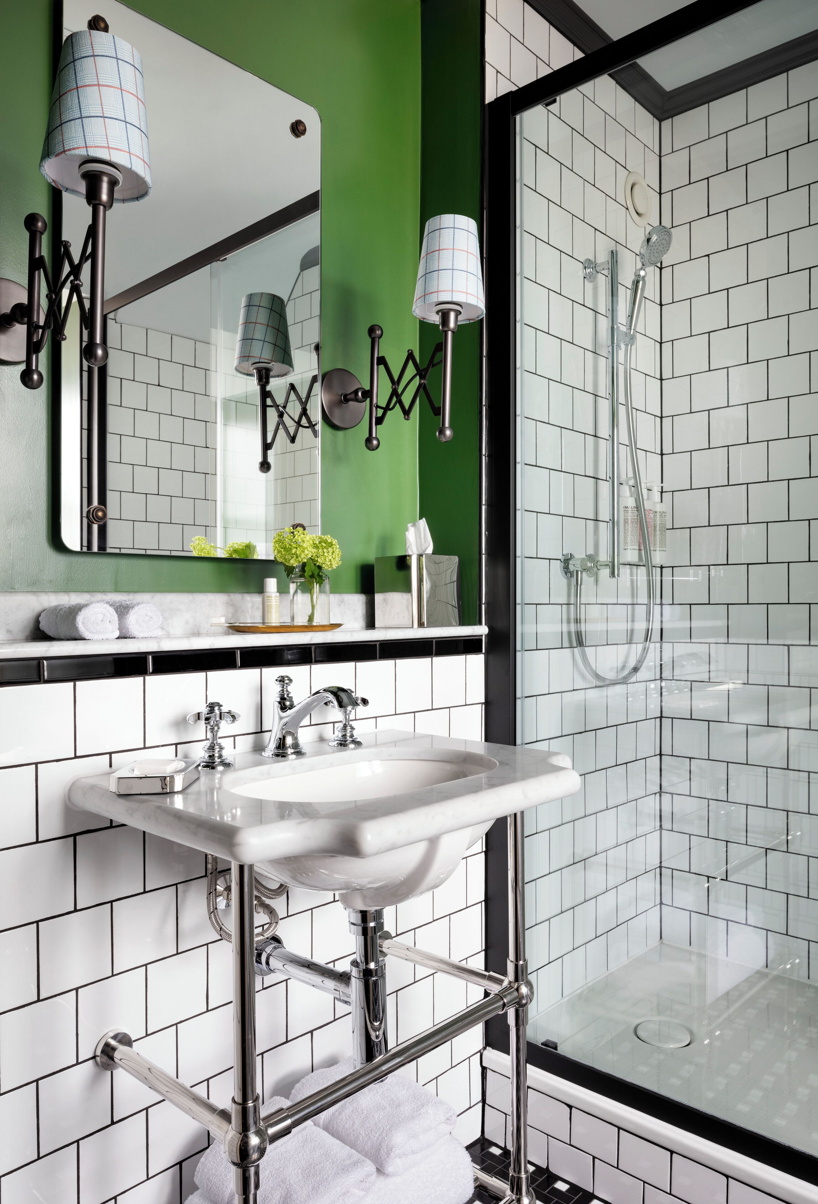 designer toiletries, hair dryer, towels