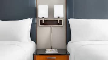 Premium bedding, pillowtop beds, desk, laptop workspace