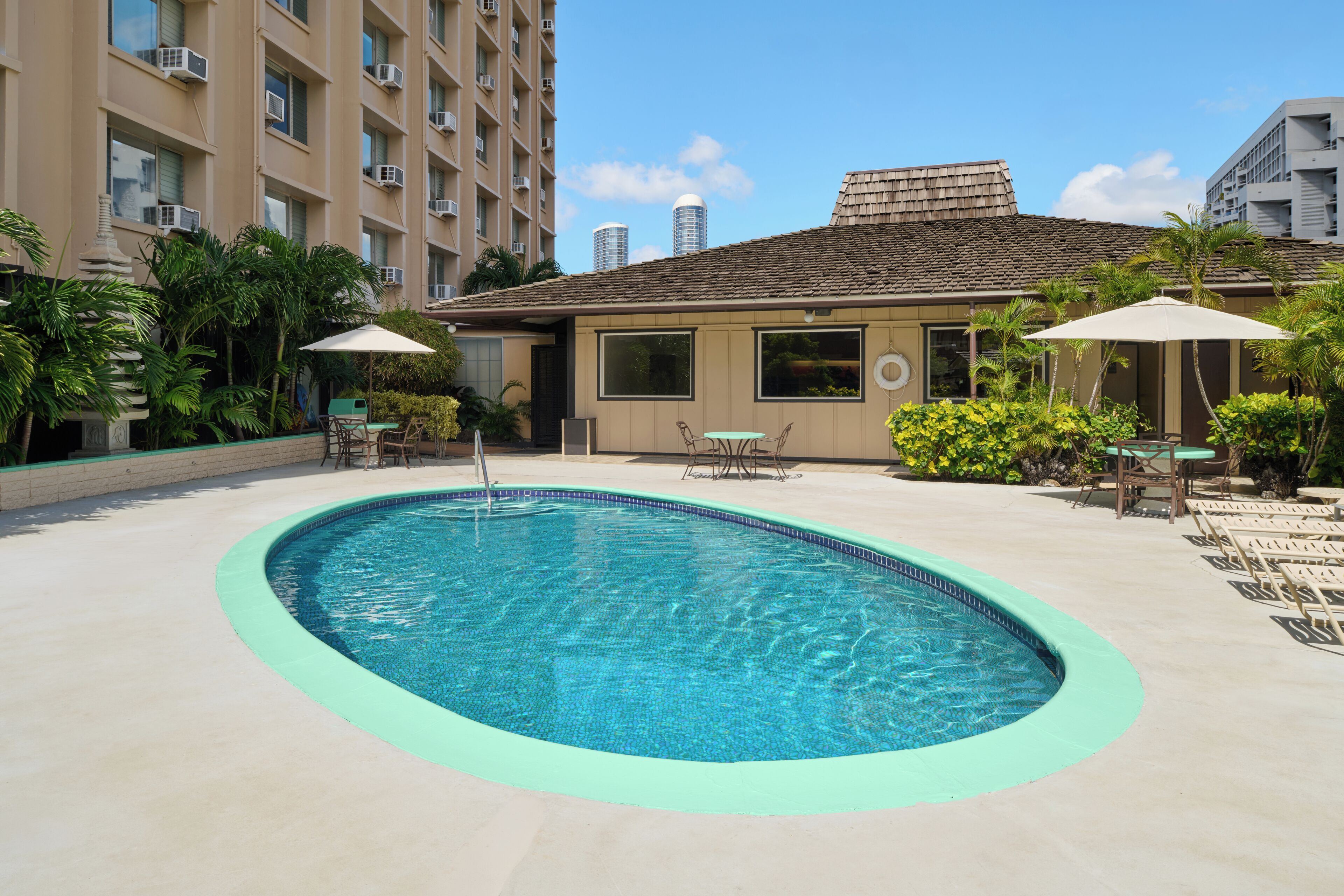 Outdoor pool, pool umbrellas, pool loungers