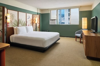 Desk, laptop workspace, iron/ironing board, cribs/infant beds at Pagoda Hotel