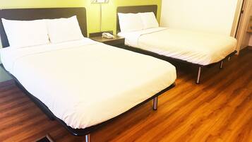 Standard Double Room, 2 Bedrooms, Smoking | Pillow-top beds, blackout curtains, WiFi, bed sheets