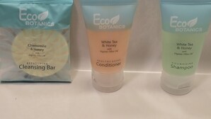 Three Eco Botanics products: a Chamomile & Honey Cleansing Bar, a White Tea & Honey Conditioner, and a White Tea & Honey Shampoo. - Willow Lodge Willoughby – Cleveland Mentor (Willoughby)