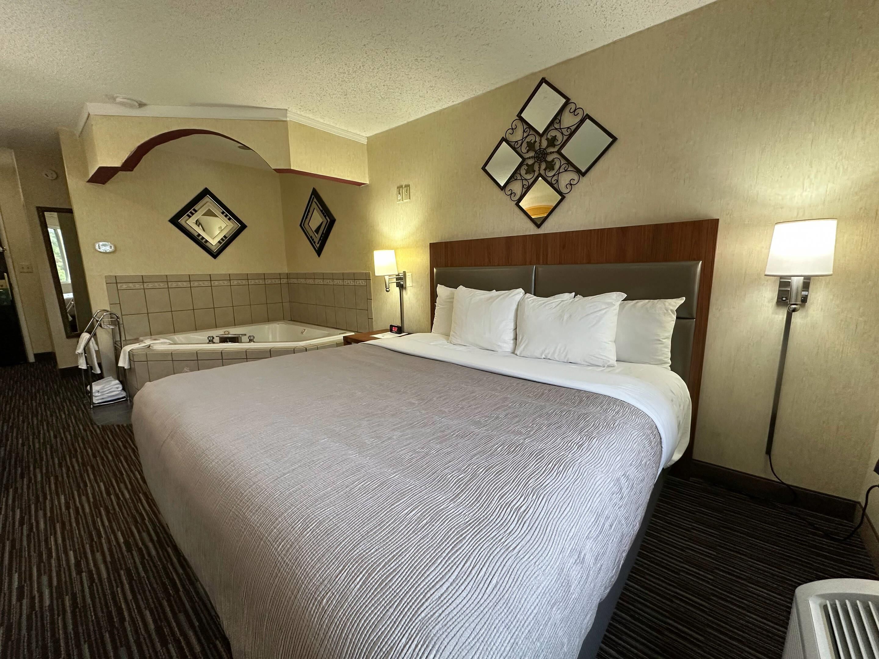 premium bedding, desk, blackout curtains, iron/ironing board