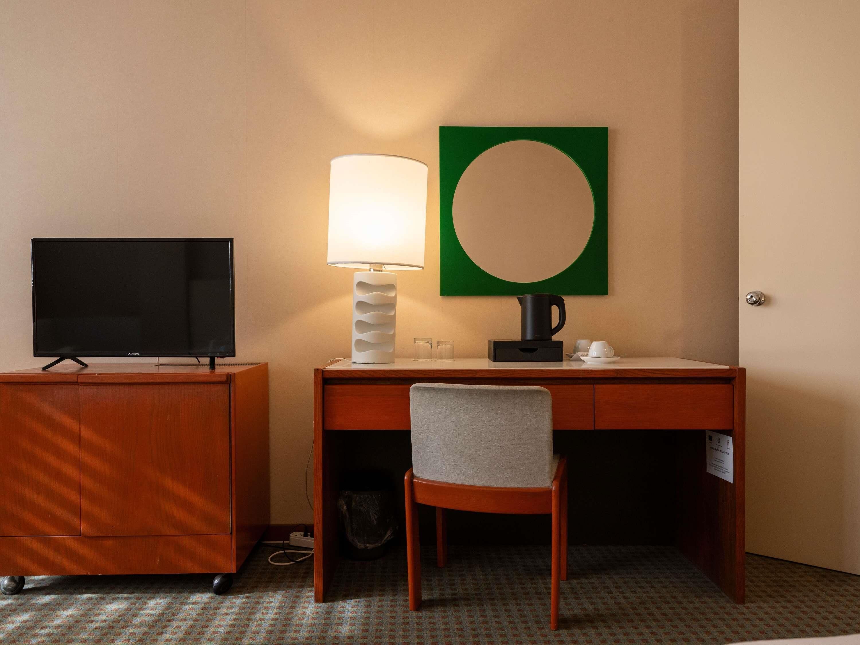 Luxe beddengoed, donsdekens, een minibar, een kluis op de kamer