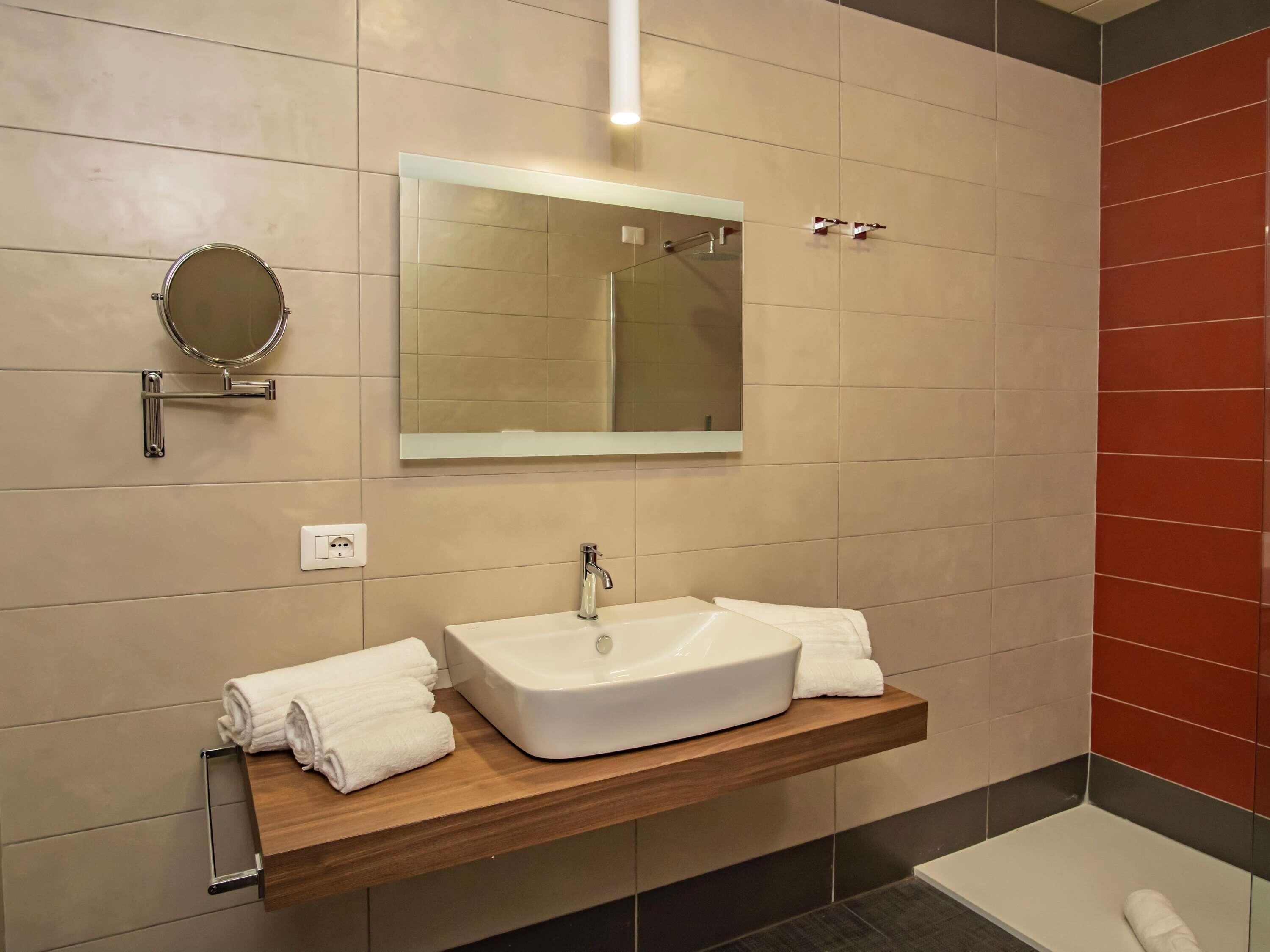 Superior kamer | Luxe beddengoed, donsdekens, een minibar, een kluis op de kamer