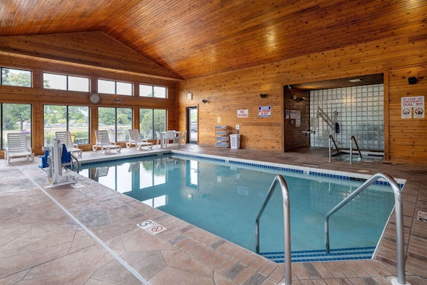 Indoor pool, open 7:00 AM to 11:00 PM, pool loungers