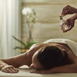Experience rejuvenation with a soothing massage treatment in a peaceful spa setting.