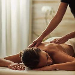 Experience a serene spa setting with a soothing ambiance and expert massage therapy.