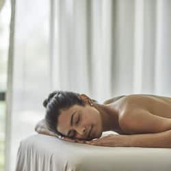Guests can enjoy a rejuvenating massage on a comfortable table.
