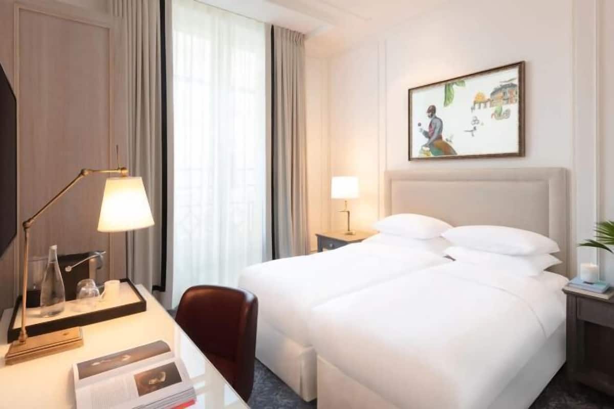 Premium bedding, pillowtop beds, minibar, in-room safe
