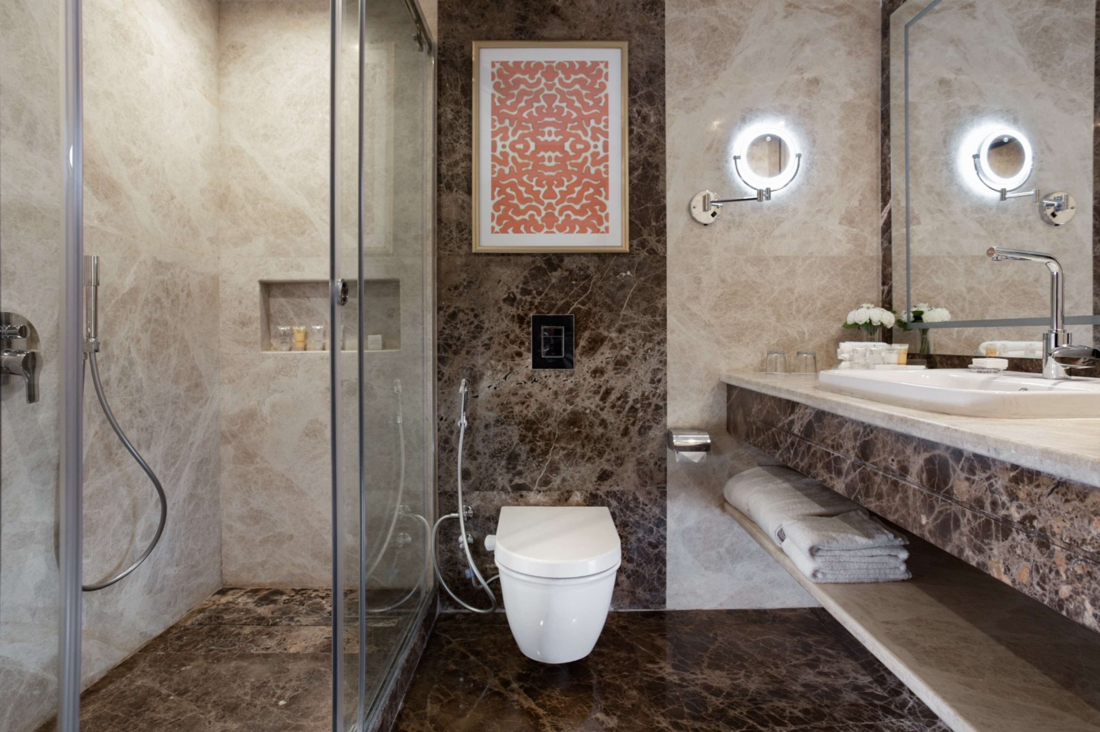 combined shower/bathtub, free toiletries, hair dryer, bathrobes