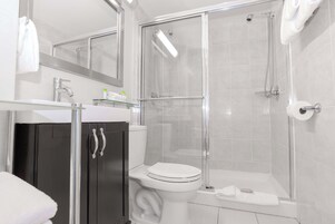 Standard Suite, 1 King Bed (Kitchenette, South Tower) | Bathroom | Combined shower/tub, eco-friendly toiletries, hair dryer, towels