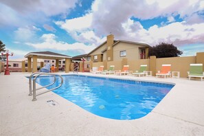 Seasonal outdoor pool, open 9:00 AM to 9:00 PM, sun loungers