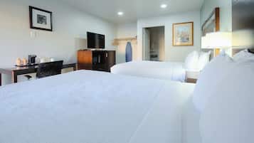 Premium bedding, pillow-top beds, desk, laptop workspace