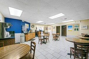 Basic Room, 2 Queen Beds | Living area | LED TV