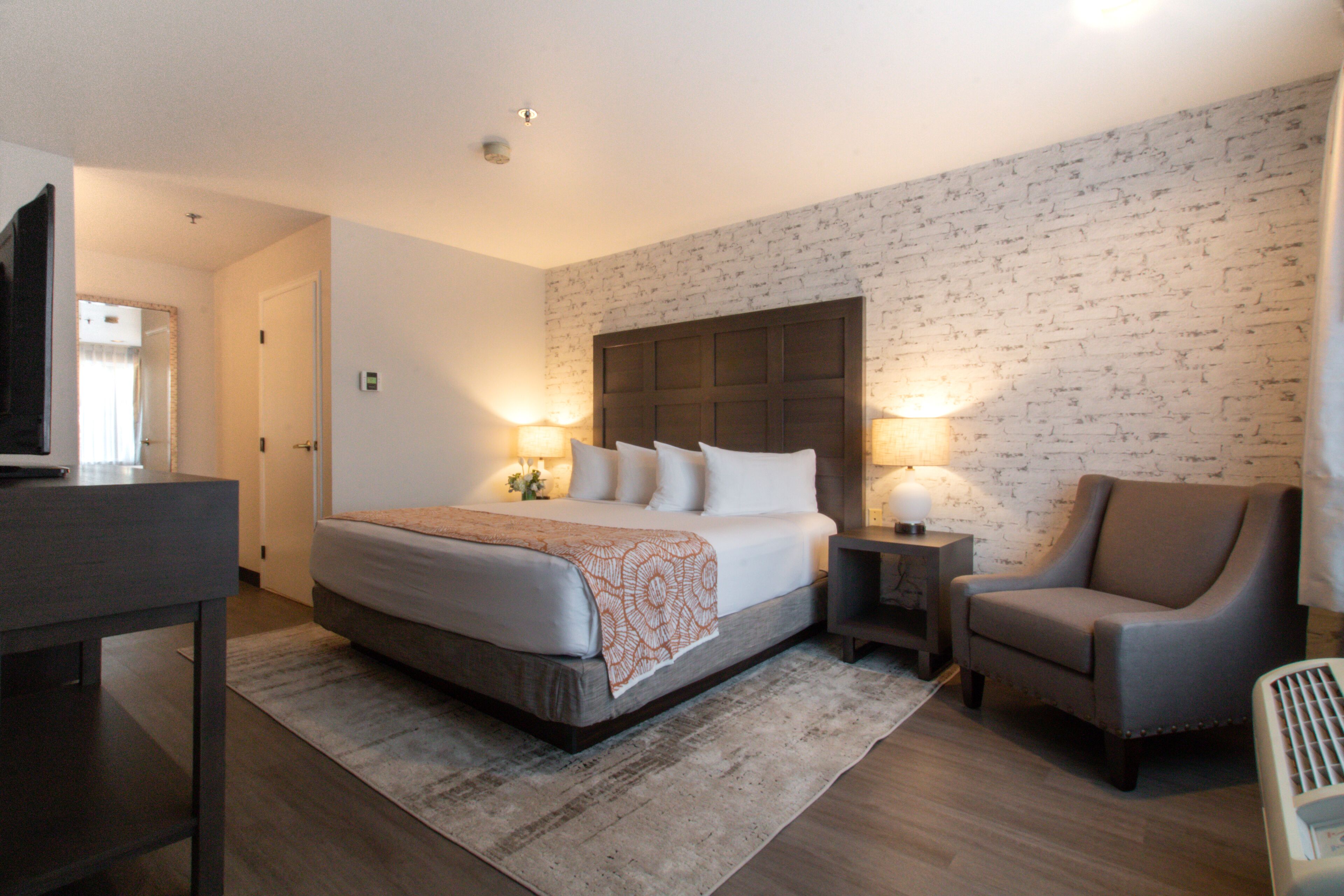 two room family suite 2 king 2 bathroom sleeper sofa | premium bedding, blackout curtains, iron/ironing board