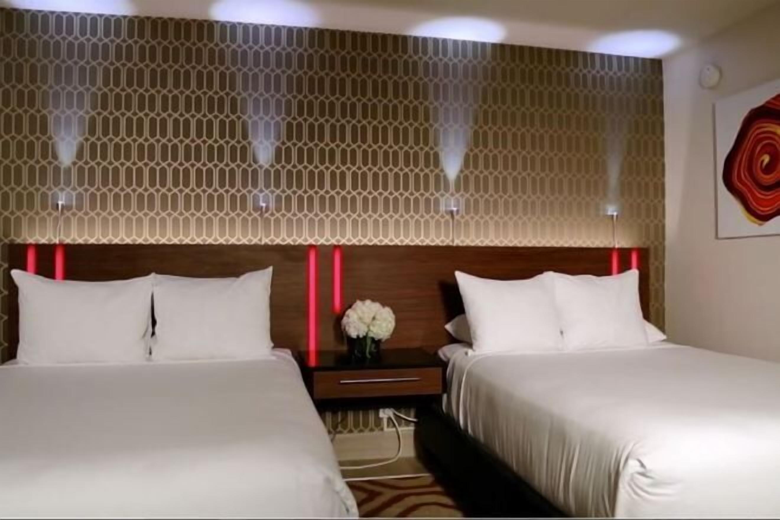 Premium bedding, pillow-top beds, in-room safe, desk