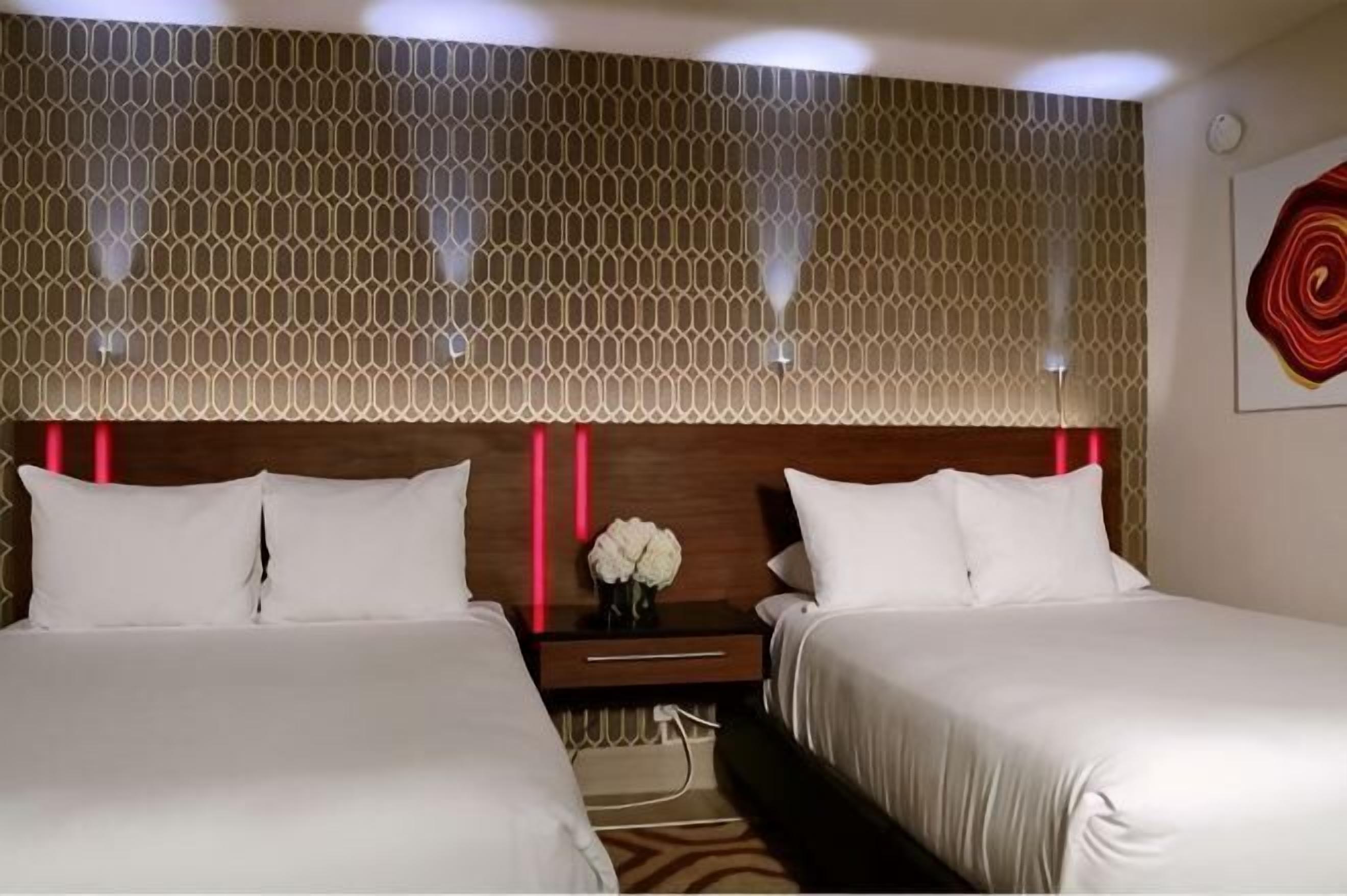 Premium bedding, pillow-top beds, in-room safe, desk