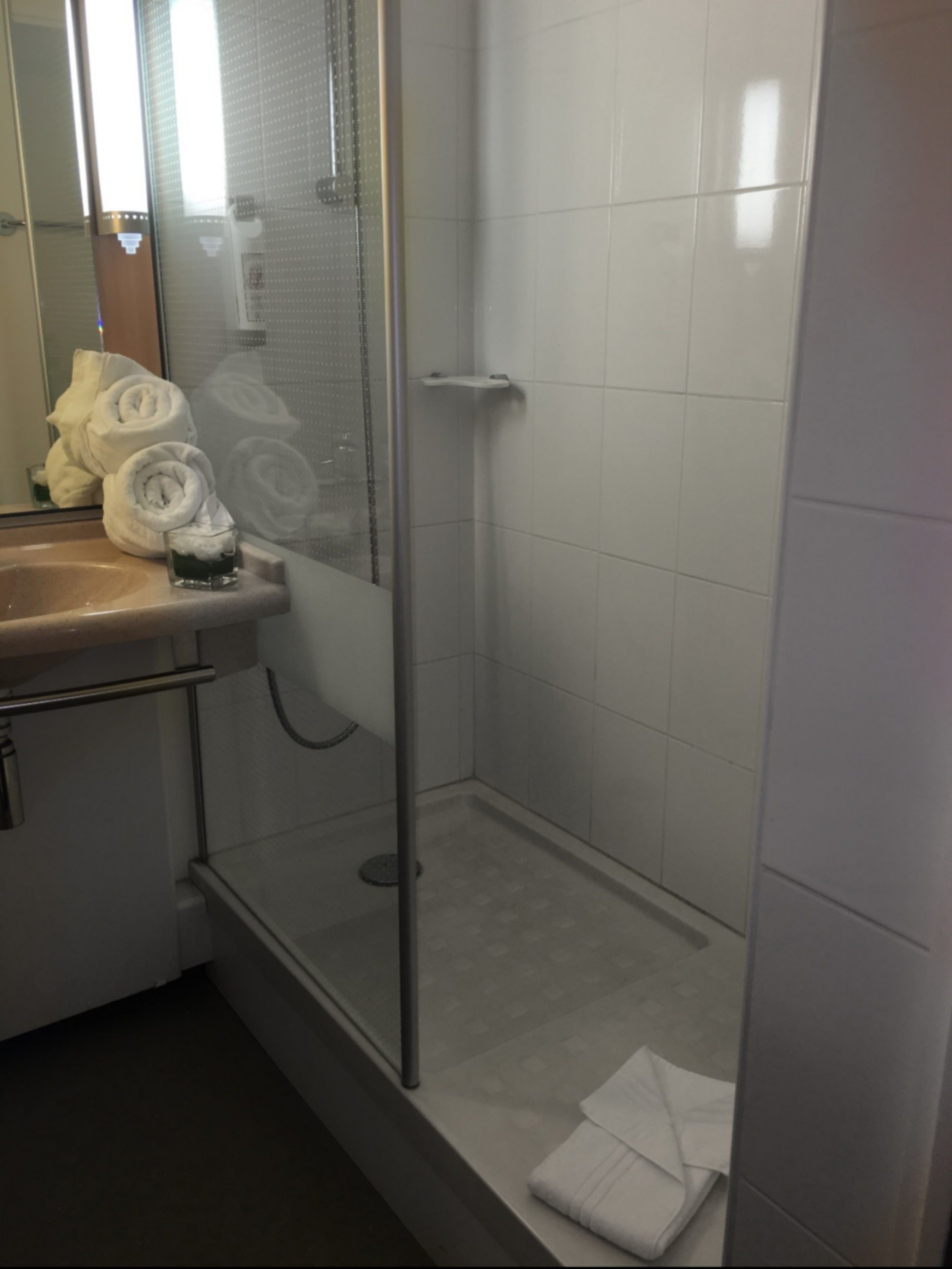 room, multiple beds | bathroom | shower, eco-friendly toiletries, hair dryer, towels
