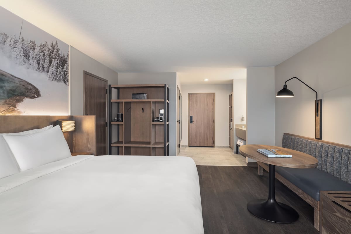 Premium bedding, pillow-top beds, laptop workspace, iron/ironing board