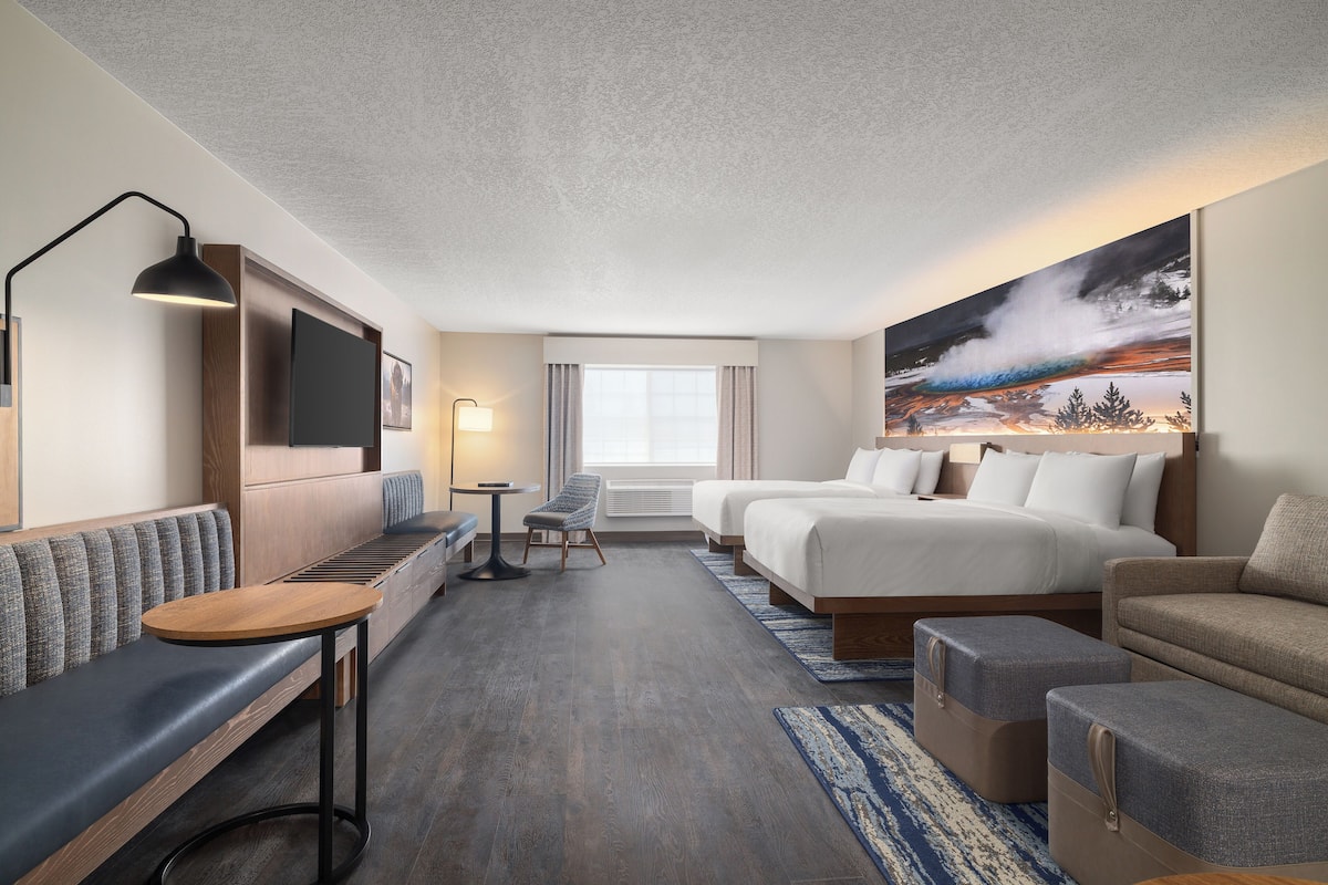 Premium bedding, pillow-top beds, laptop workspace, iron/ironing board