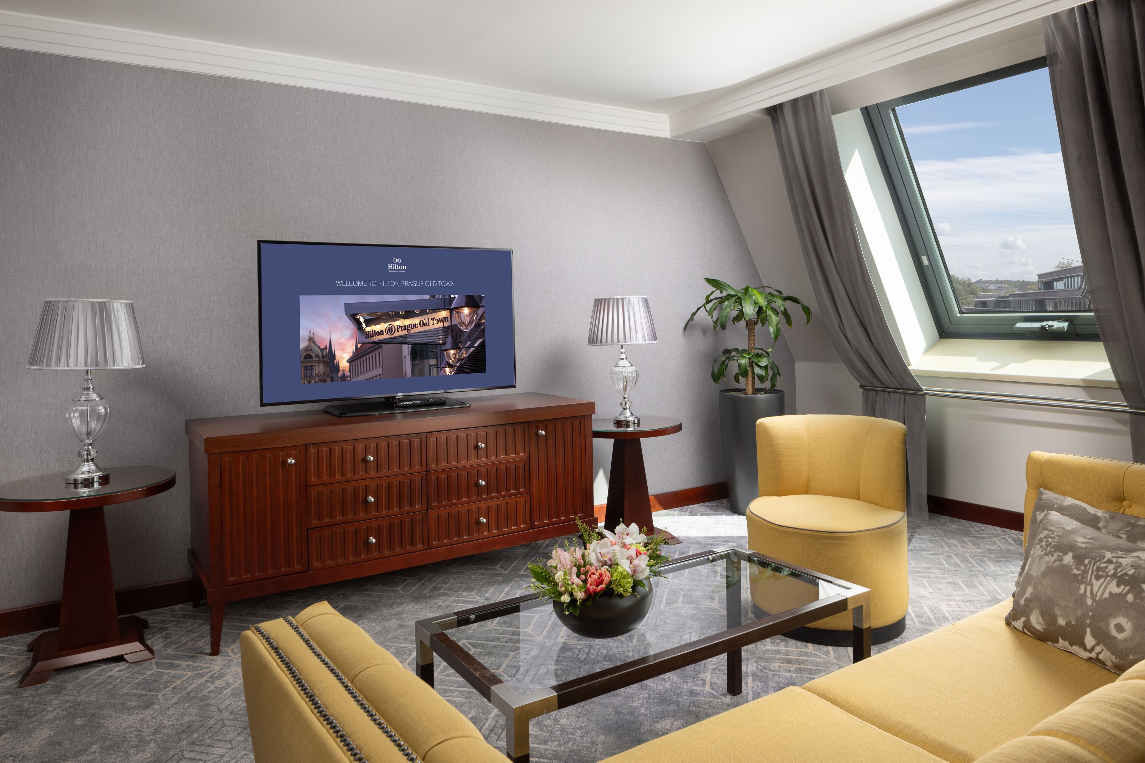 suite, 1 king bed, city view (governor) | living area | 55-inch tv with cable channels