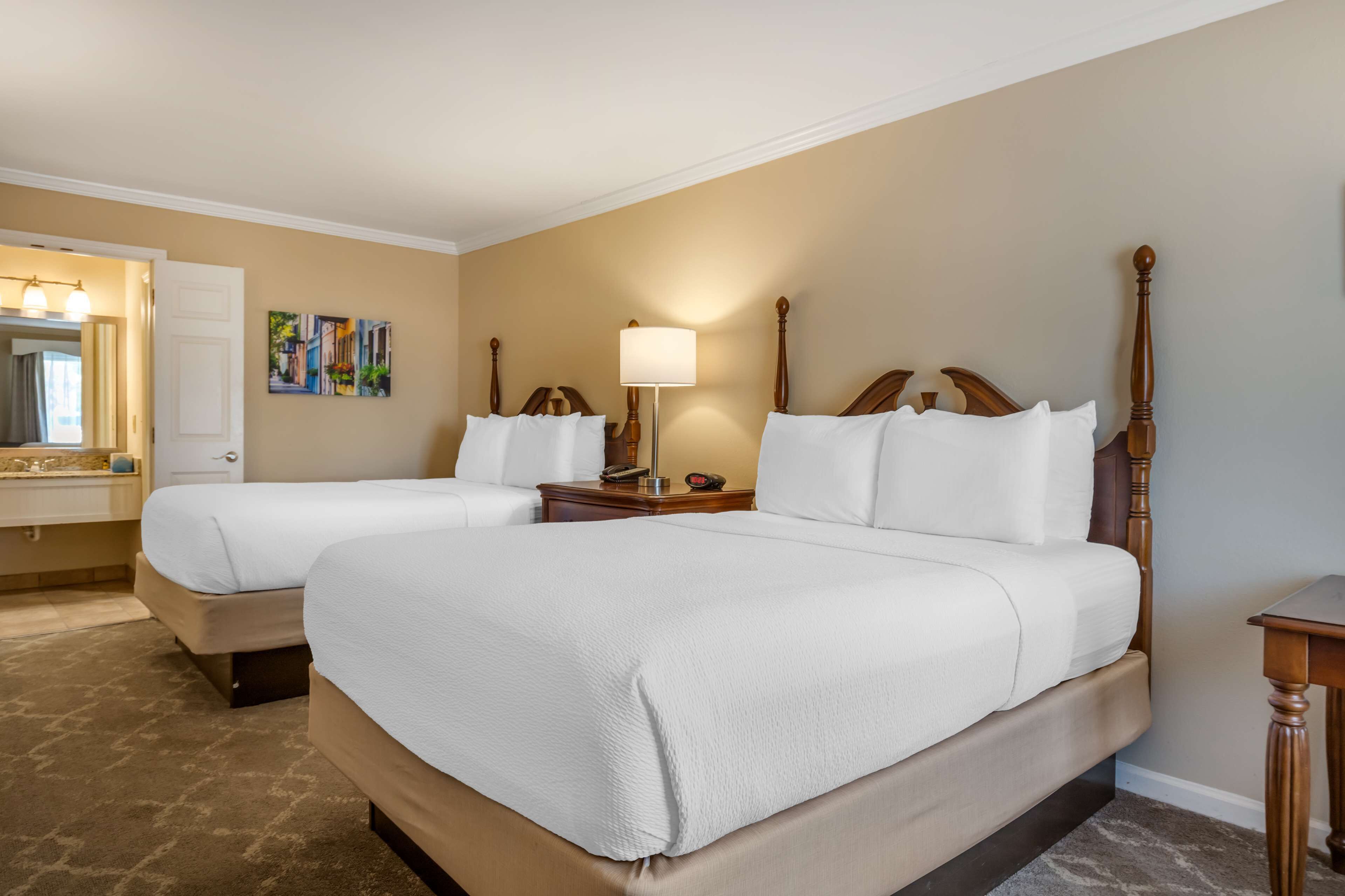 standard room, 2 queen beds, non smoking, jetted tub | desk, laptop workspace, iron/ironing board, wifi