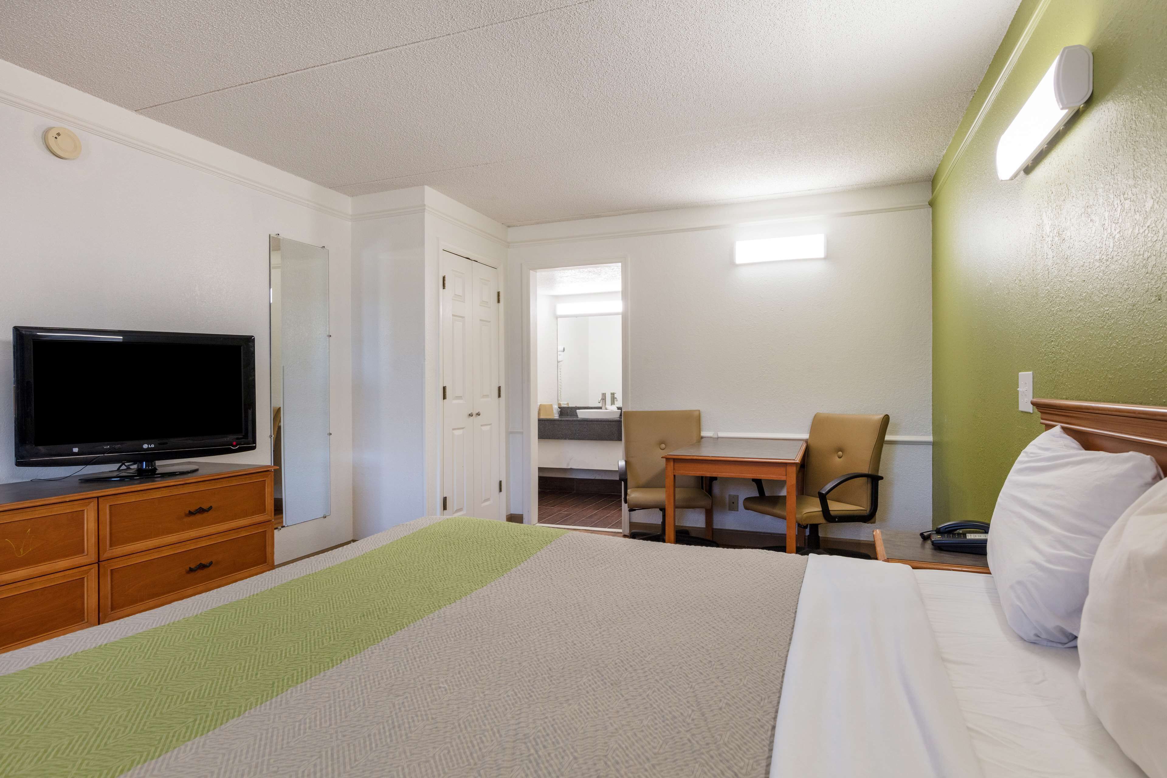 Desk, blackout curtains, free WiFi, bed sheets