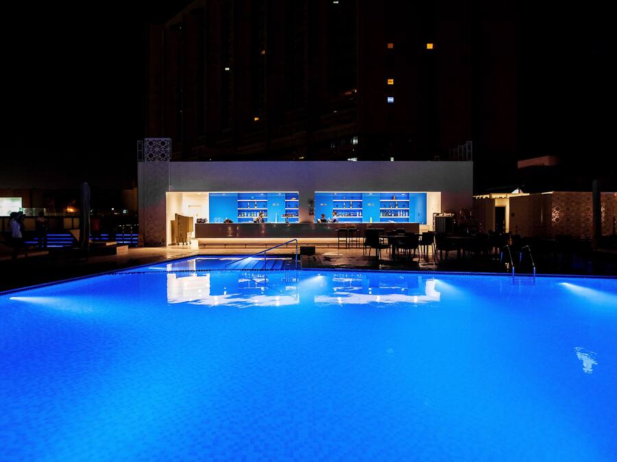 Outdoor pool, open 8:00 AM to 8:00 PM, free cabanas, pool umbrellas
