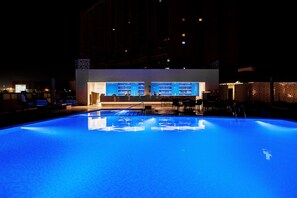 Outdoor pool, open 8:00 AM to 8:00 PM, free cabanas, pool umbrellas