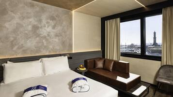 Habitación ejecutiva, 1 cama King size y sofá cama | Ropa de cama hipoalergénica y minibar