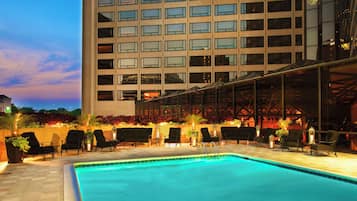 Seasonal outdoor pool, open 10:00 AM to 10:00 PM, sun loungers