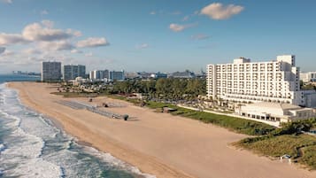 Private beach, white sand, beach umbrellas, beach towels