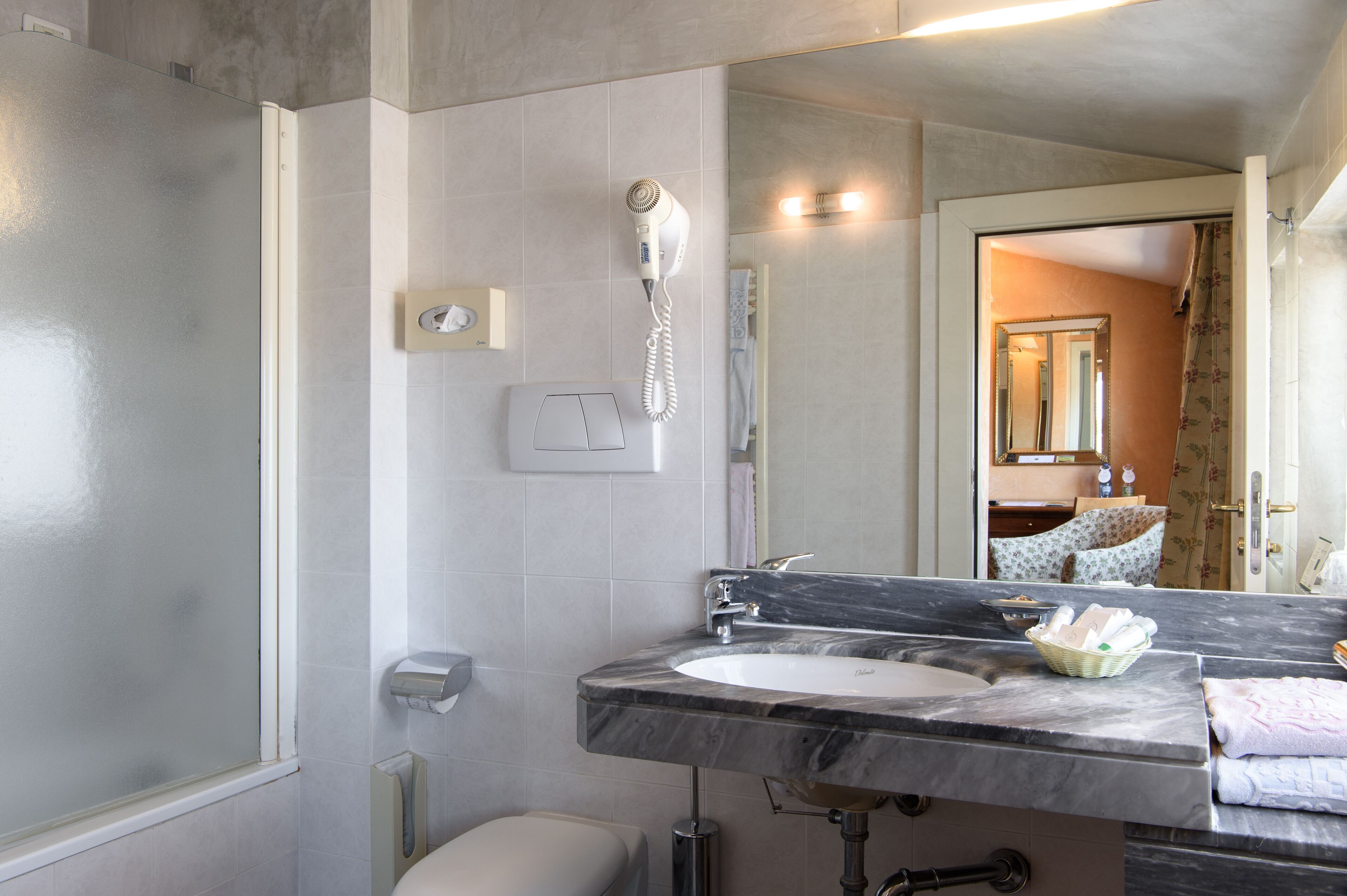 eco-friendly toiletries, hair dryer, bidet, towels