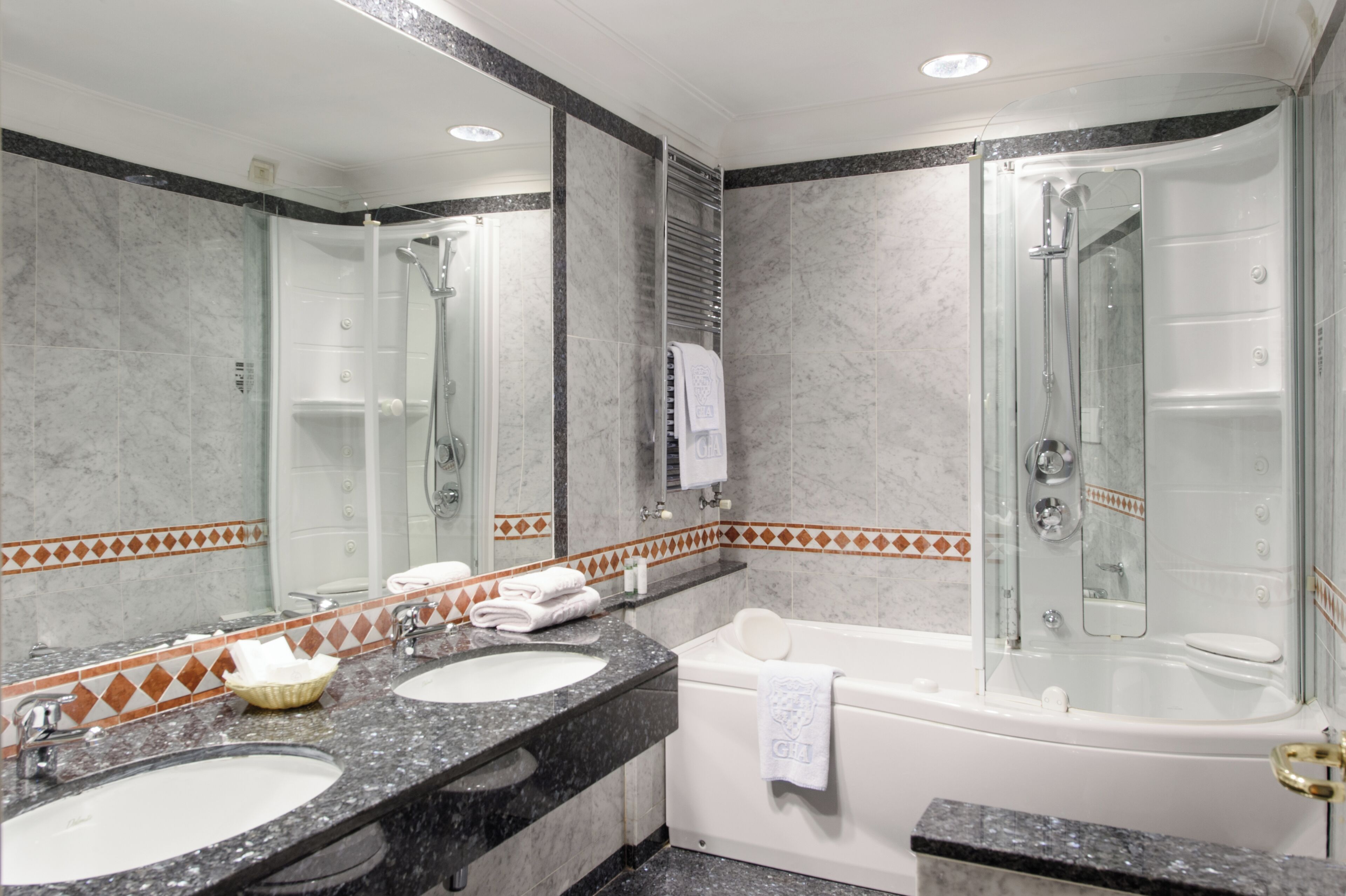 Eco-friendly toiletries, hair dryer, bidet, towels