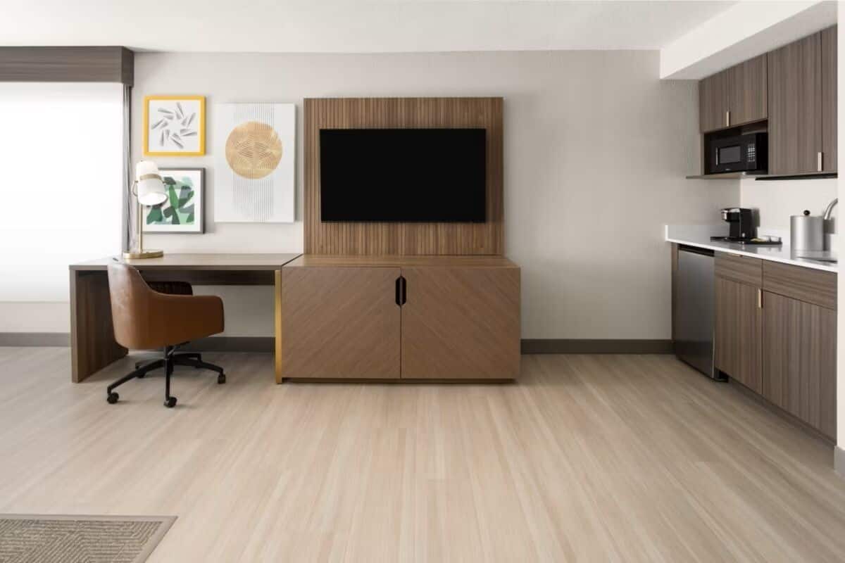 premium bedding, pillow-top beds, desk, laptop workspace