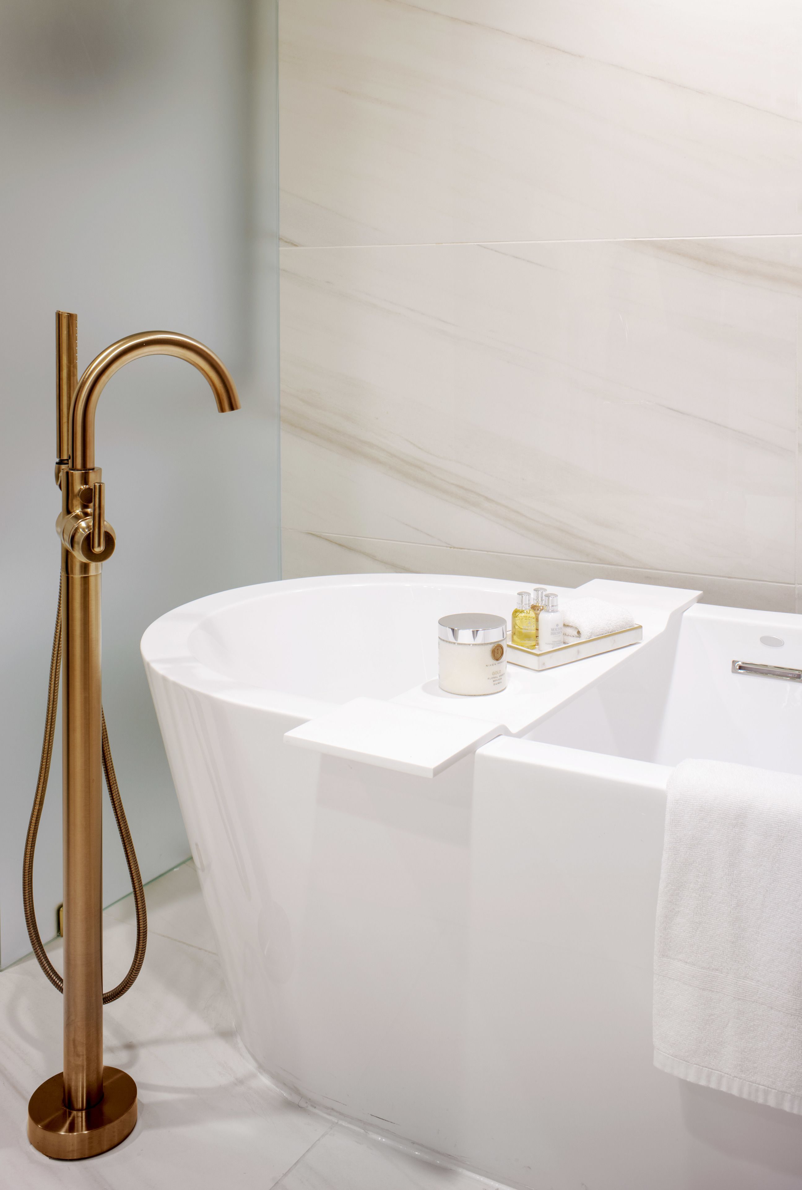 Designer toiletries, hair dryer, bathrobes, slippers