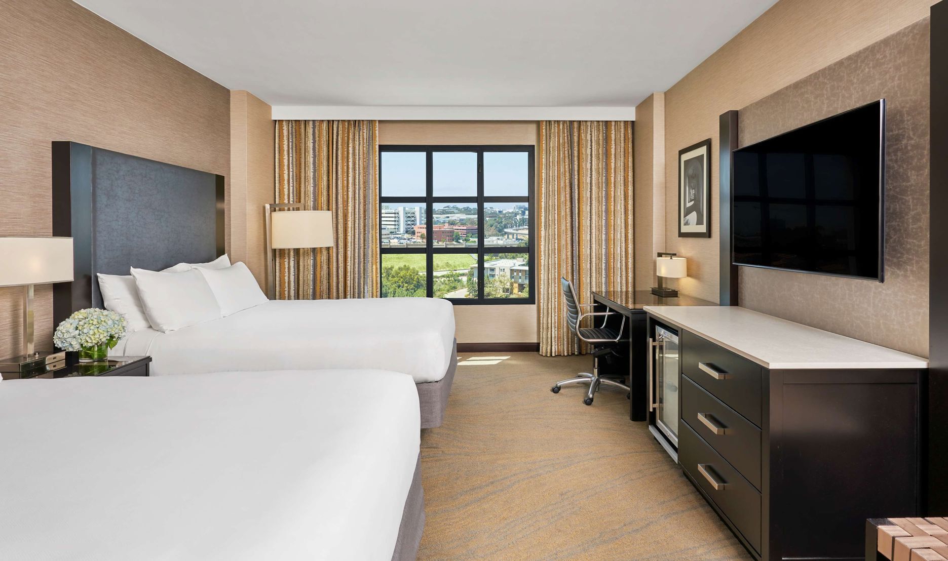Hypo-allergenic bedding, pillowtop beds, in-room safe, desk