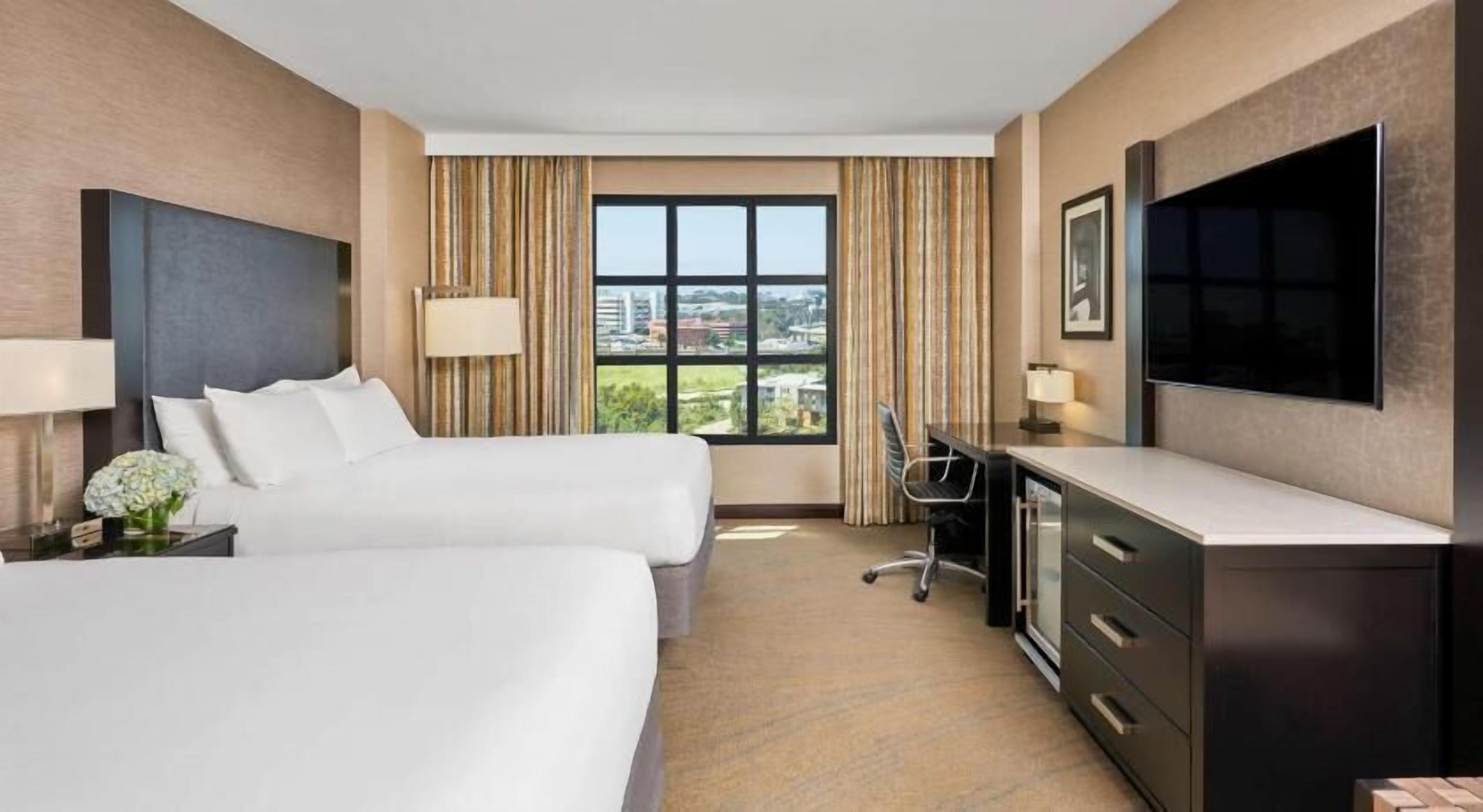 Hypo-allergenic bedding, pillowtop beds, in-room safe, desk