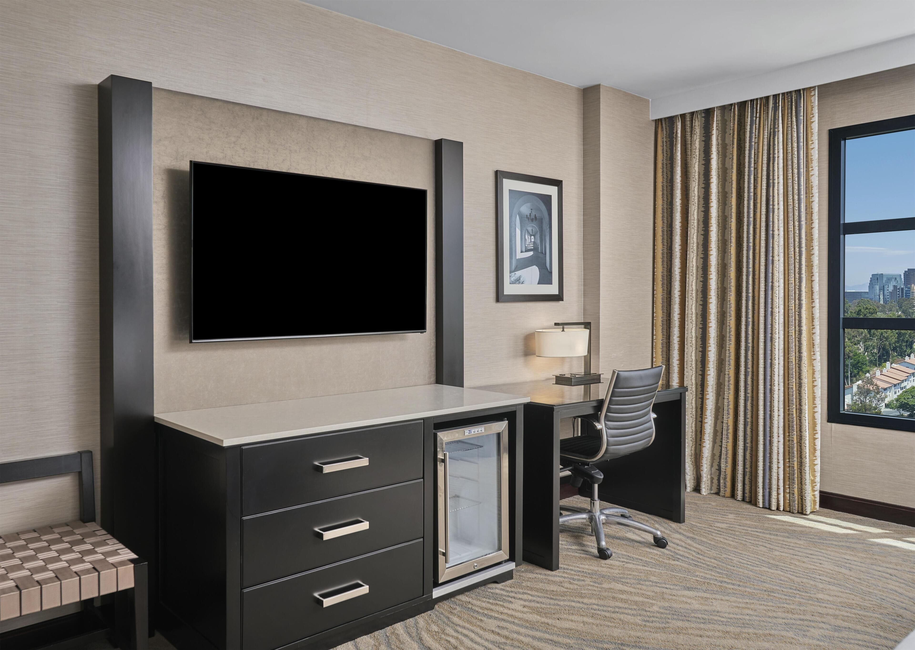 Hypo-allergenic bedding, pillow-top beds, in-room safe, desk