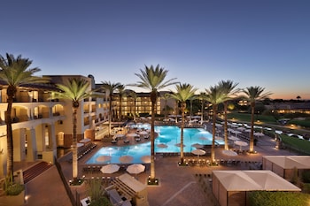 6 outdoor pools, open 6:00 AM to 10:00 PM, sun loungers at Fairmont Scottsdale Princess