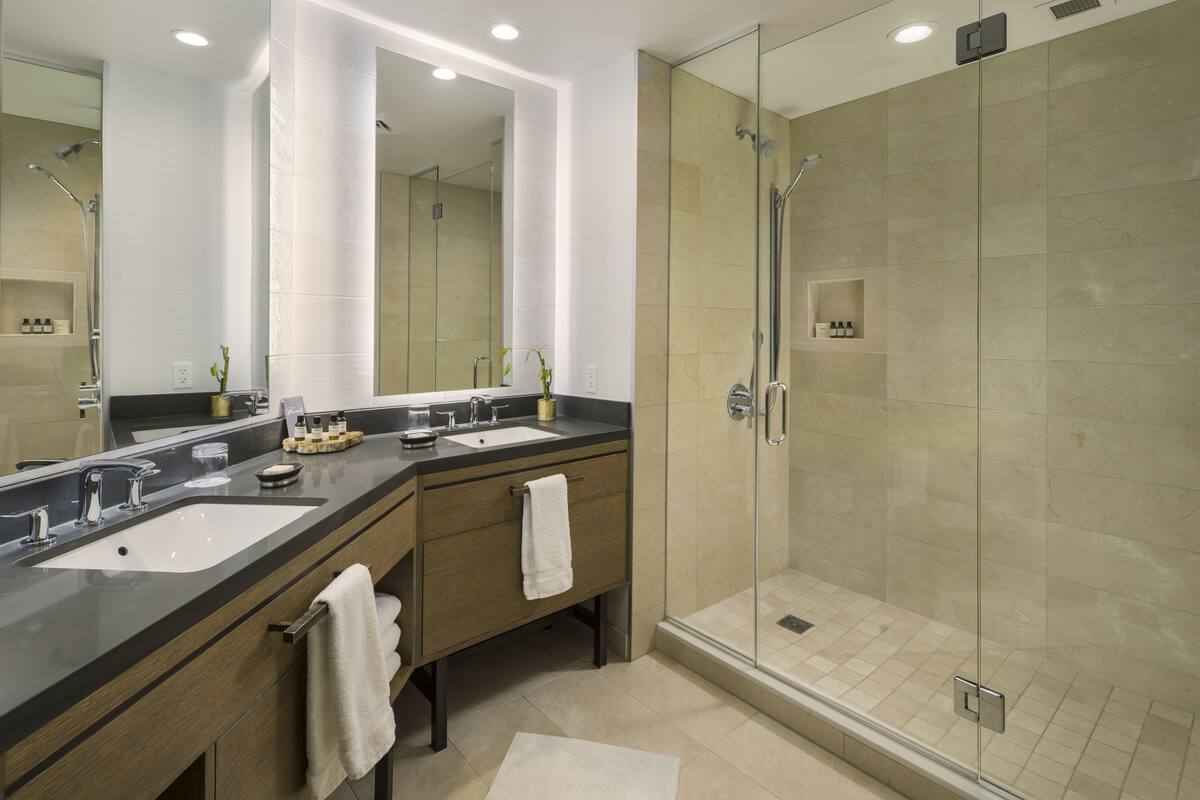 designer toiletries, hair dryer, bathrobes, towels