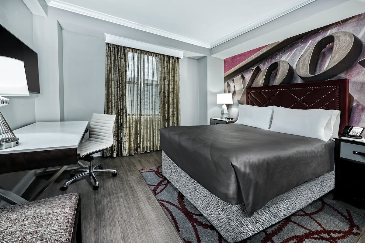 Premium bedding, pillow-top beds, in-room safe, desk