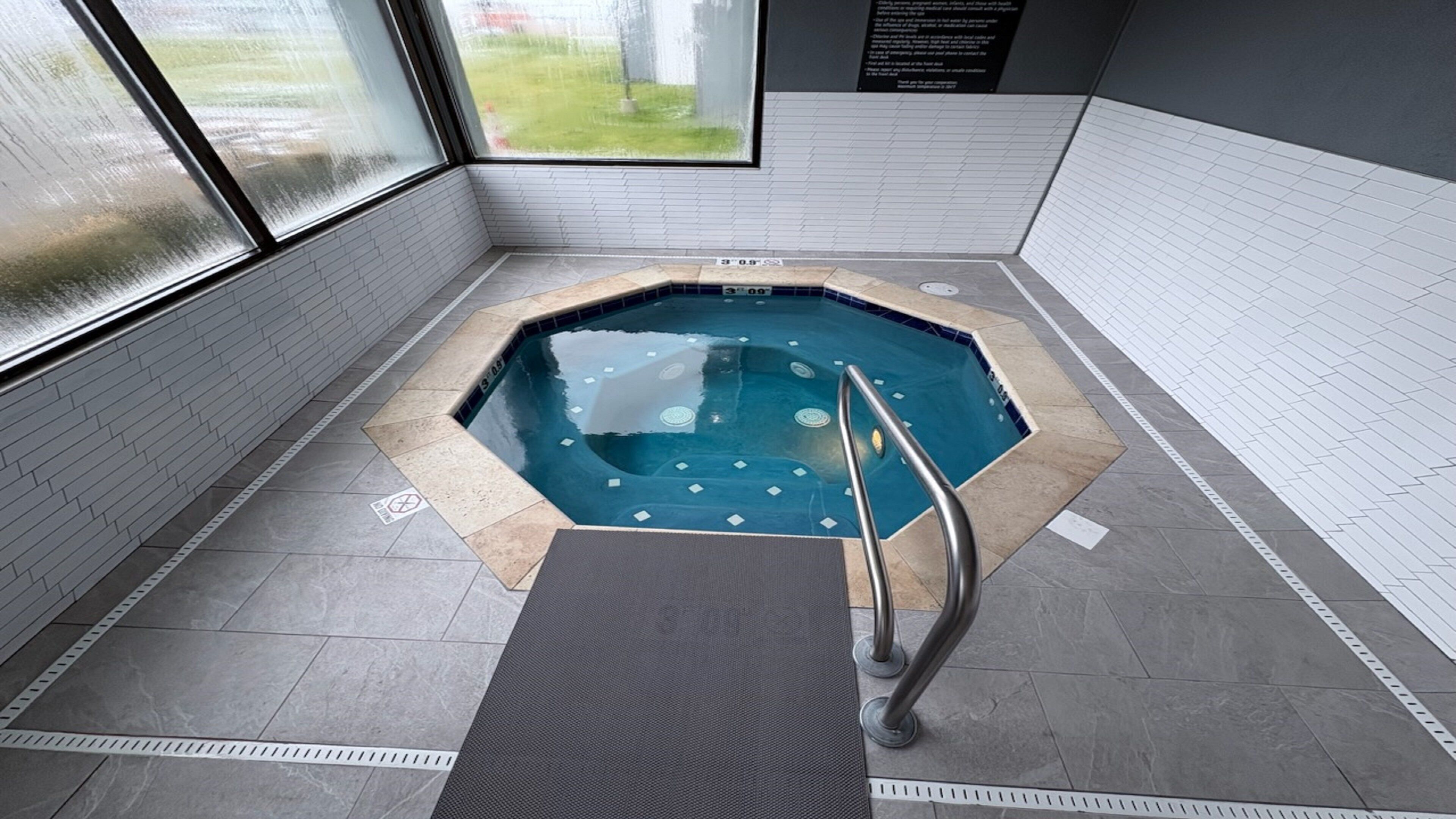 seasonal outdoor pool, open 9:30 am to 10:00 pm, pool umbrellas