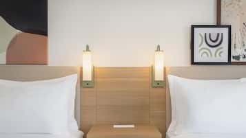 Roupas de cama premium, escrivaninha, quartos à prova de som