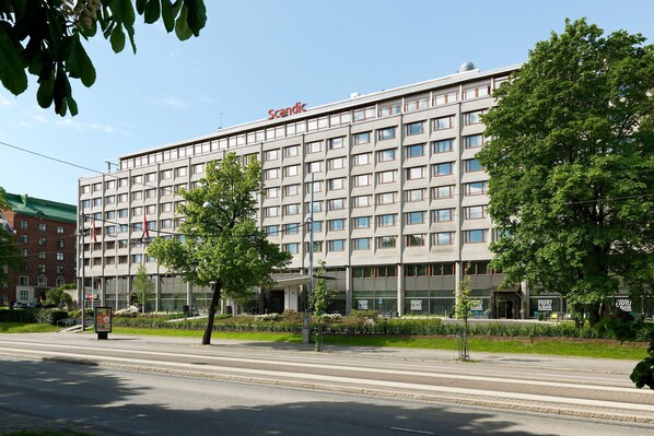 A large, modern hotel with a flat facade, multiple windows, and a prominent "Scandic" sign. - Scandic Park Helsinki (Helsinki)