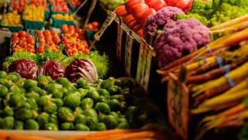 A market with various fruits and vegetables on display.