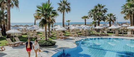 Indoor pool, outdoor pool, pool umbrellas, sun loungers